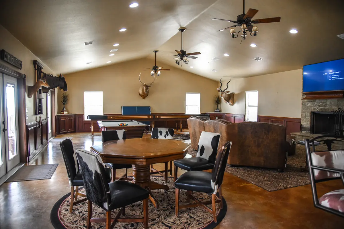 Lodge bar with animal skin chairs and rustic decor