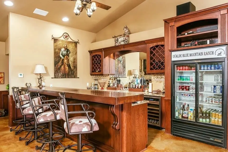 A rustic kitchen with stools