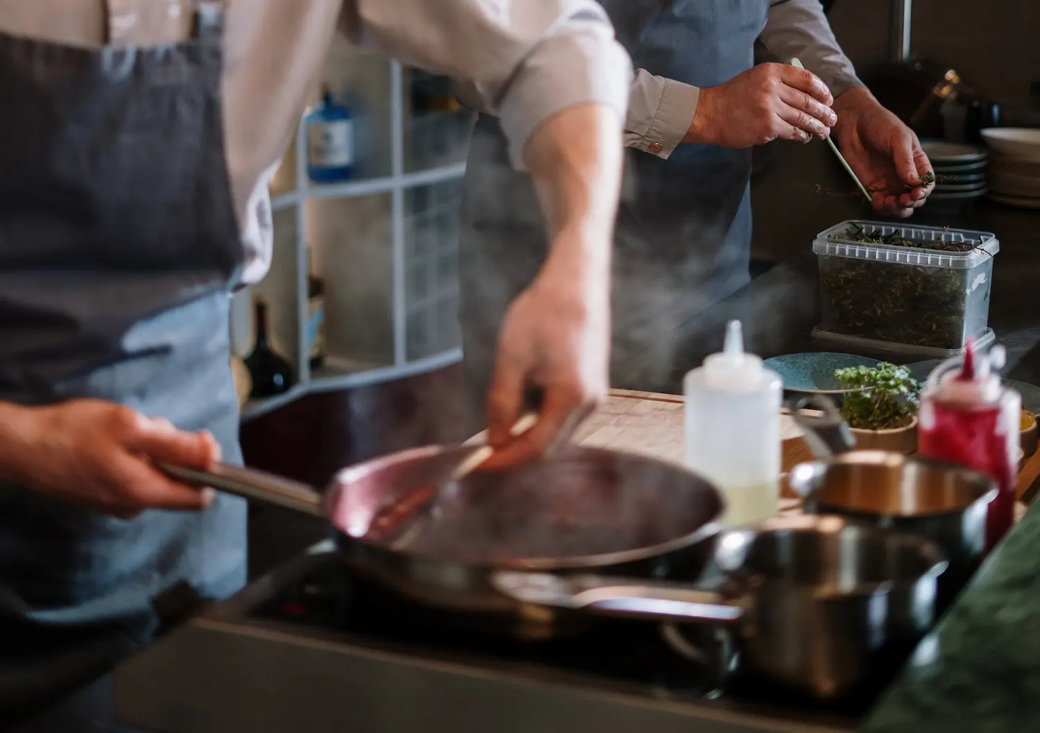 A chef cooking meat