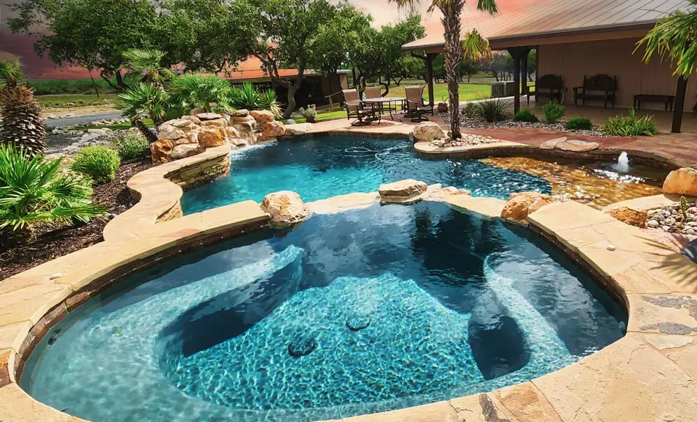 Pool with natural rocks decorating the outside